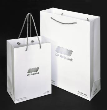 Small paper bag size 20 x 27 cm. Side 11 cm thick. Large paper bag size 30 x 40 cm. Side 13 cm thick.