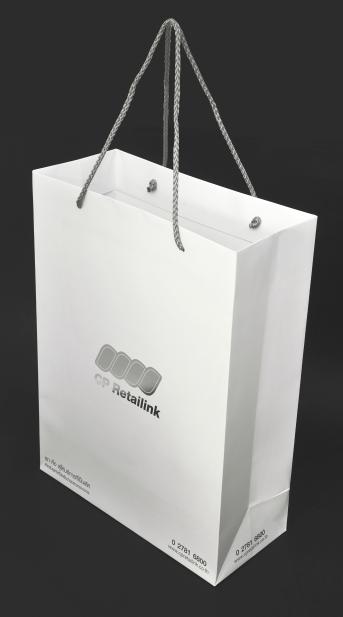 White paper bag, logo and printed text - Shiny silver foil shade. Die Cut ,Bag molding